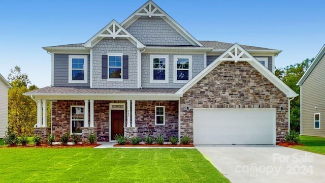 craftsman-style home featuring a front lawn, covered porch, and a garage