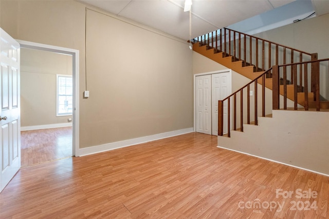 stairway featuring hardwood / wood-style floors