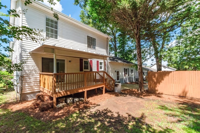 rear view of property with a deck