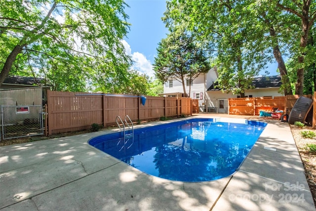 view of pool with a patio area