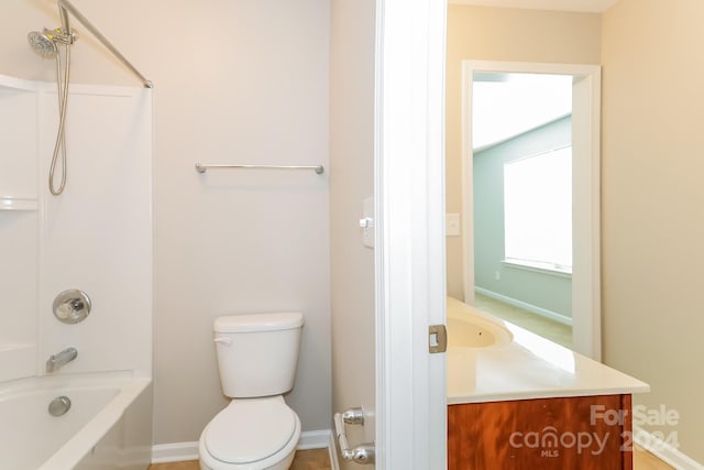 full bathroom with vanity, tub / shower combination, and toilet