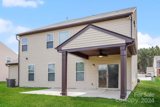 back of property featuring ceiling fan, a lawn, a patio, and central air condition unit