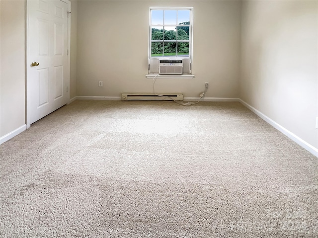 empty room featuring a baseboard heating unit, carpet flooring, and cooling unit