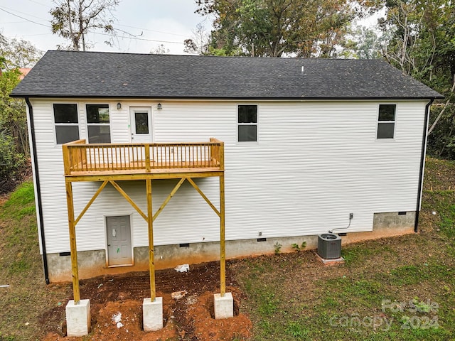 rear view of property with central air condition unit