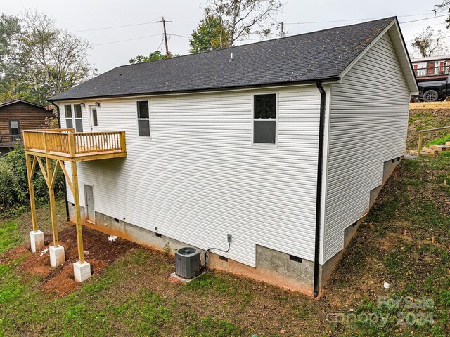 view of home's exterior featuring central AC