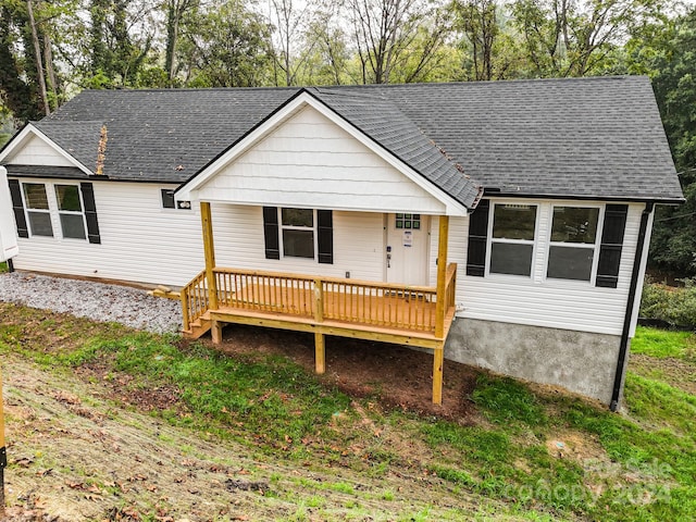 view of front of home with a deck