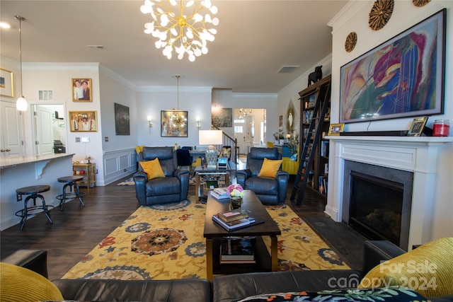 living room featuring ornamental molding, dark wood-type flooring, and a chandelier