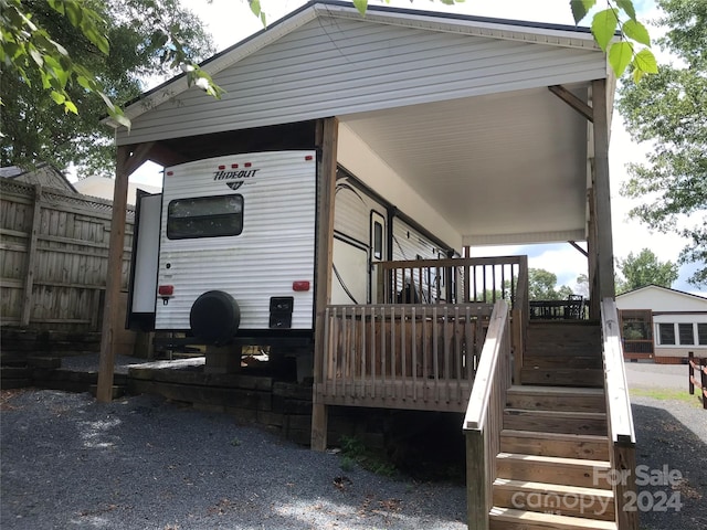 view of property exterior with covered porch