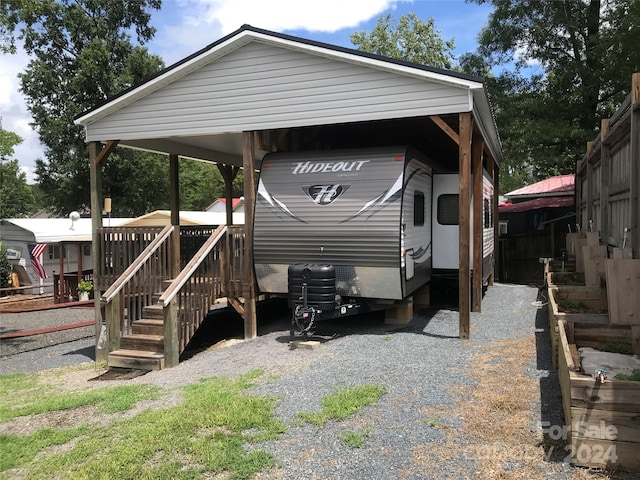 view of parking featuring a carport