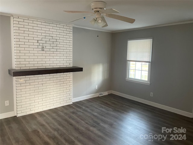 unfurnished living room with ceiling fan, dark hardwood / wood-style flooring, and crown molding