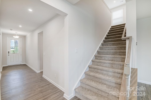 entrance foyer with wood-type flooring