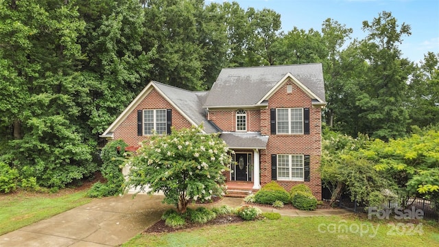 view of front of home with a front lawn