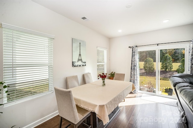 dining area featuring hardwood / wood-style flooring