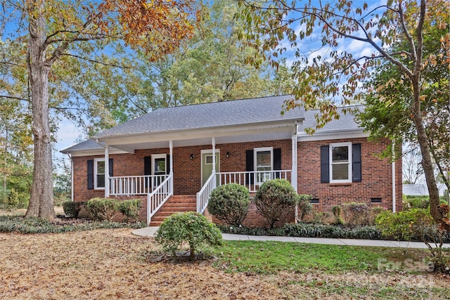 ranch-style house featuring a porch