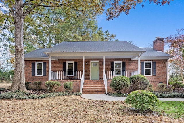 ranch-style house featuring a porch