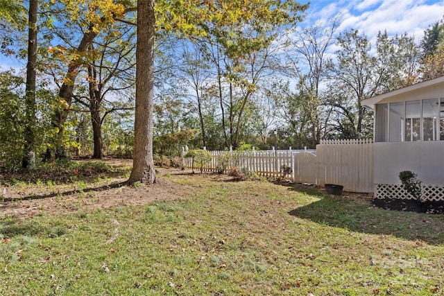 view of yard with a sunroom