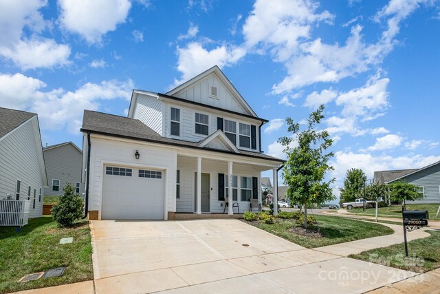 view of front of home with covered porch and central AC unit