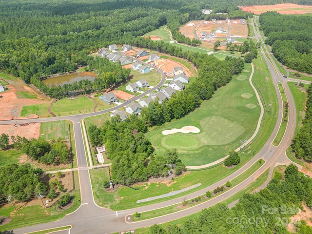 bird's eye view with a view of trees