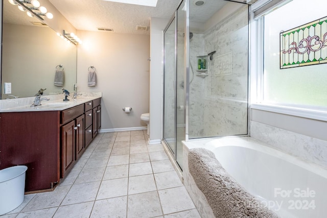 full bathroom featuring plus walk in shower, toilet, a textured ceiling, and vanity