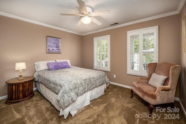 carpeted bedroom featuring crown molding, a textured ceiling, and ceiling fan