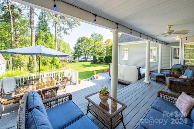 deck featuring an outdoor hangout area and ceiling fan