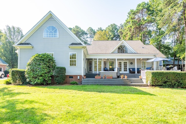 back of house with crawl space, a lawn, french doors, and a shingled roof