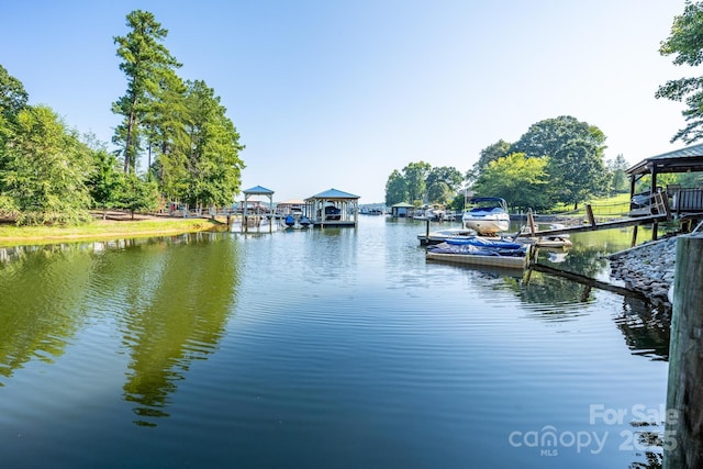 property view of water featuring a boat dock