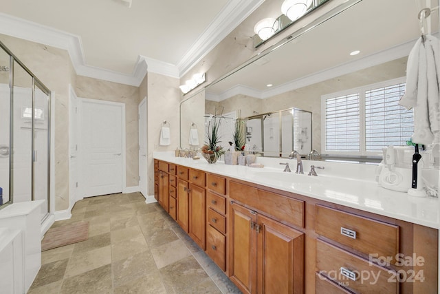 bathroom featuring vanity, an enclosed shower, and crown molding