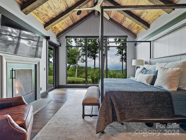 bedroom with beamed ceiling, access to exterior, and wooden ceiling