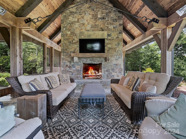 view of patio / terrace featuring an outdoor living space with a fireplace