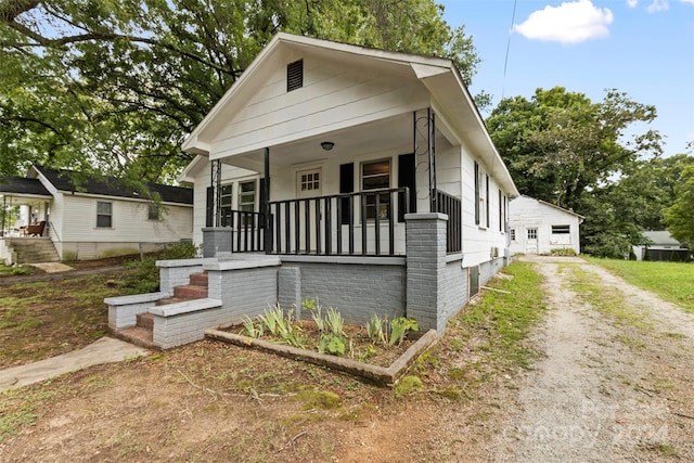 bungalow-style home with covered porch