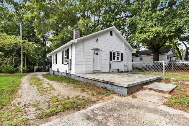 rear view of house featuring a patio area