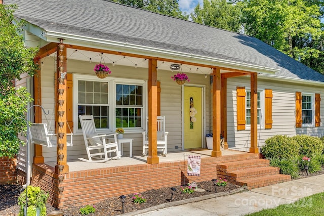 view of front of home featuring covered porch