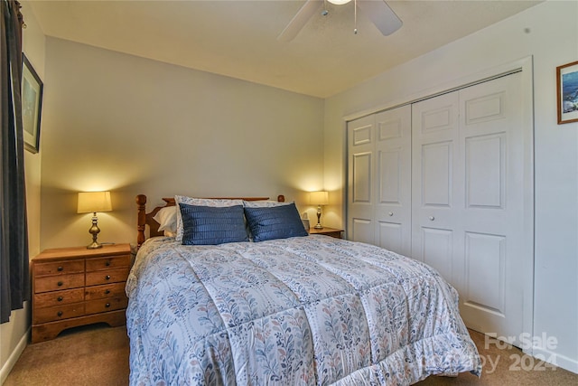 bedroom featuring ceiling fan, carpet flooring, and a closet