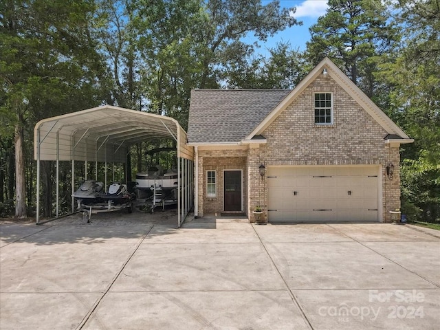 view of front of property with a garage and a carport