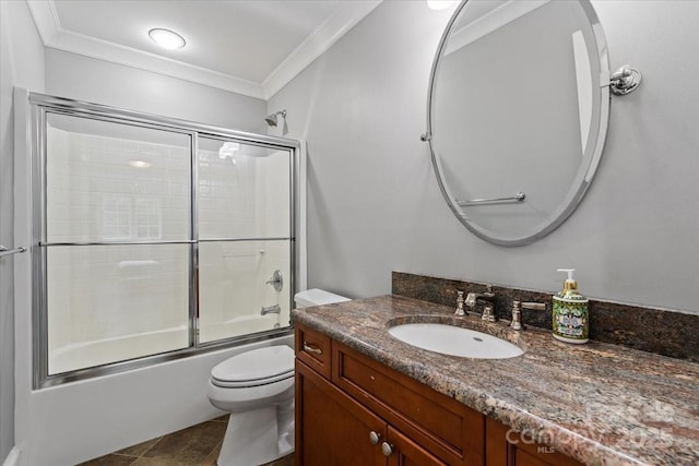 full bathroom with vanity, ornamental molding, shower / bath combination with glass door, and toilet