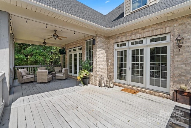 deck with french doors, ceiling fan, and outdoor lounge area