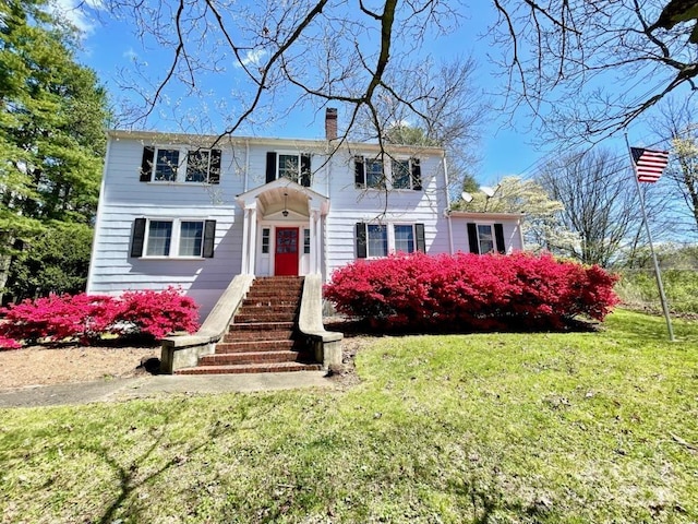 view of front of house with a front yard