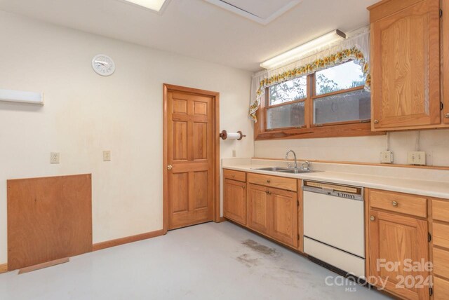 kitchen with dishwasher and sink