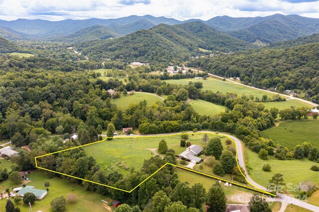 bird's eye view with a mountain view