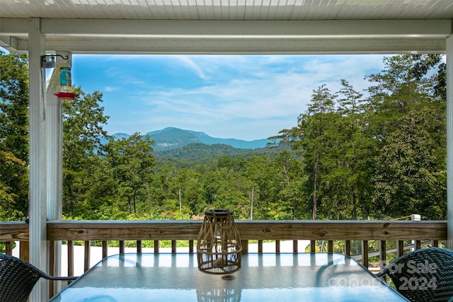 view of mountain feature featuring a forest view