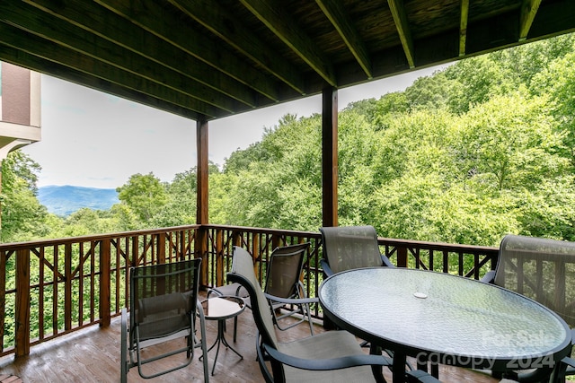 deck featuring outdoor dining area