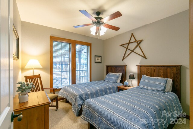 bedroom featuring carpet floors and ceiling fan