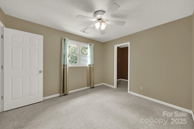 9143 Sadlers Ridge Rd, Fort Mill, SC 29707 - unfurnished bedroom with carpet floors, baseboards, a textured ceiling, and ceiling fan