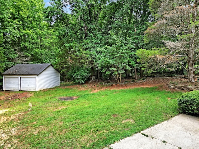 9143 Sadlers Ridge Rd, Fort Mill, SC 29707 - view of grassy yard featuring a garage and an outbuilding