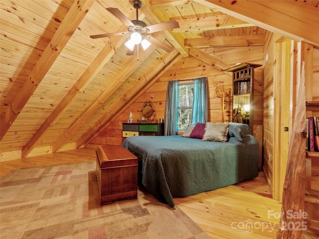 bedroom featuring wood walls, vaulted ceiling with beams, hardwood / wood-style flooring, ceiling fan, and wooden ceiling