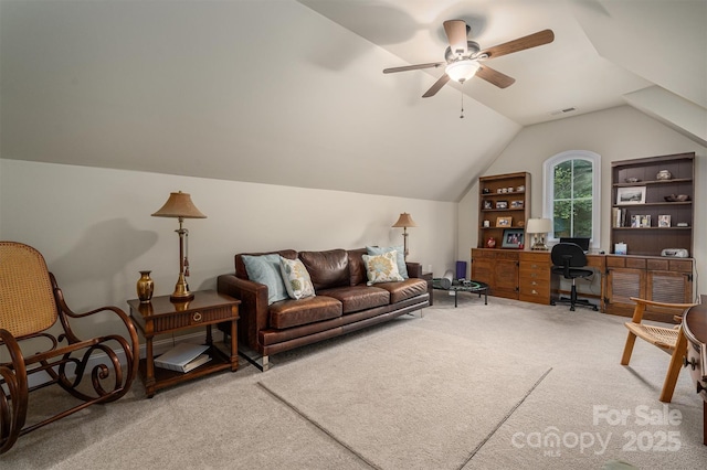 interior space featuring ceiling fan and lofted ceiling