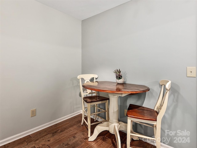 dining room featuring dark wood-type flooring