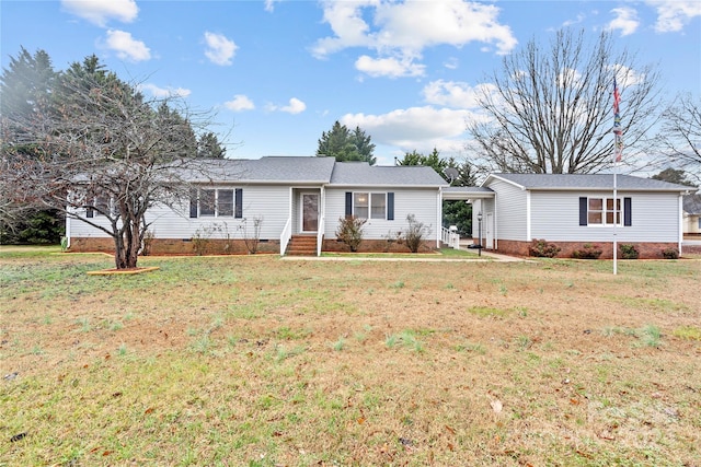 ranch-style house featuring a front yard