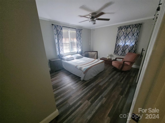 bedroom with a ceiling fan, baseboards, ornamental molding, and dark wood-style flooring